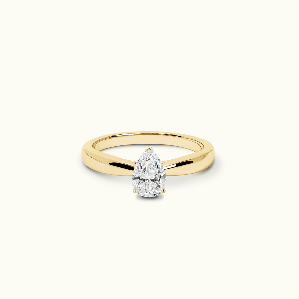 Jewellers District's Diamond Engagement Ring with Tapered Thick Band in 14k Yellow Gold, Pear