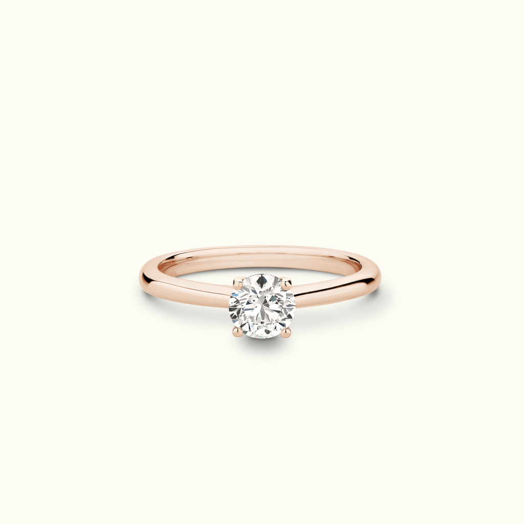 Jewellers District's Solitaire Diamond Engagement Ring with Cathedral-Setting in 14k Rose Gold, Round