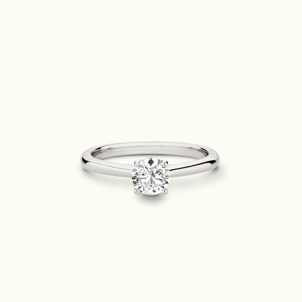 Jewellers District's Solitaire Diamond Engagement Ring with Cathedral-Setting in 14k White Gold, Round