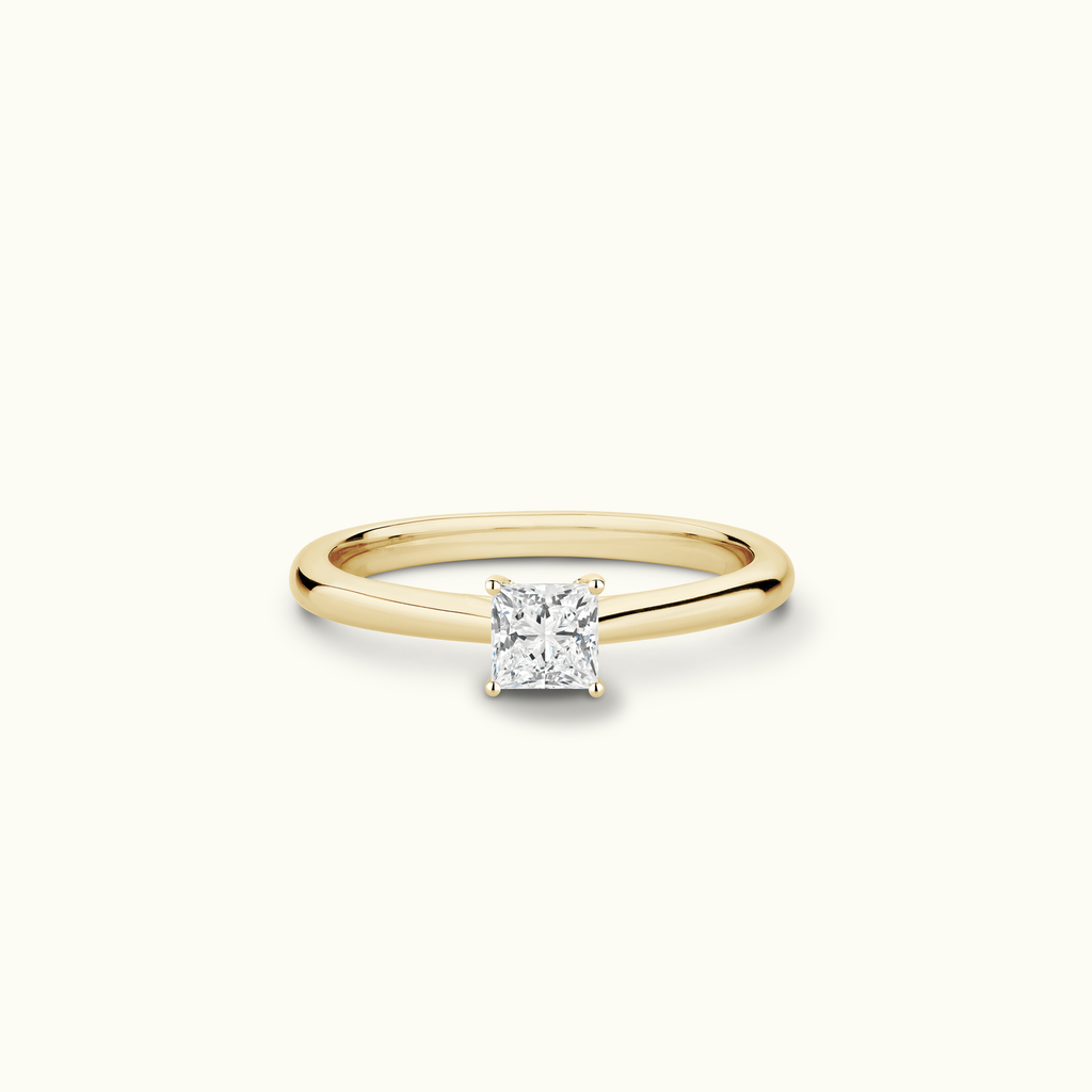 Jewellers District's Solitaire Diamond Engagement Ring with Cathedral-Setting in 14k Yellow Gold, Princess