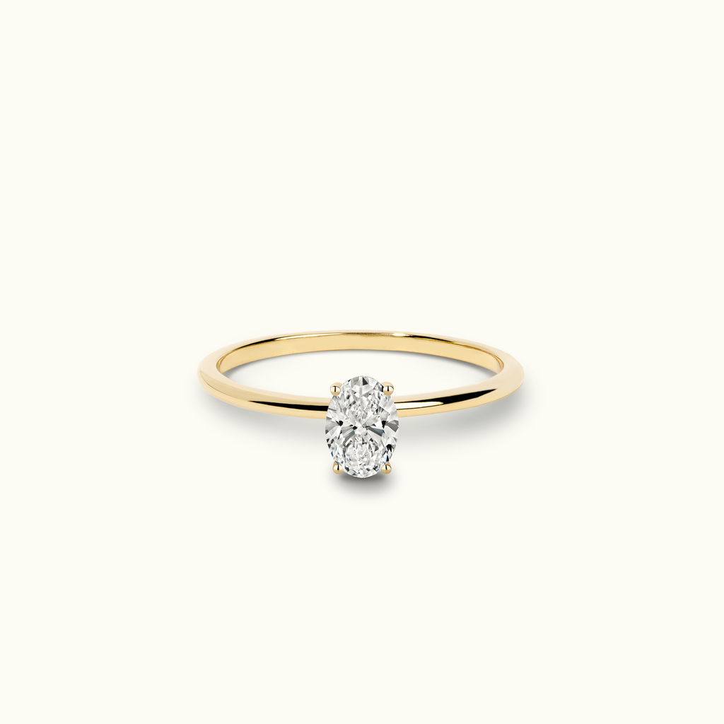 Jewellers District's Solitaire Diamond Engagement Ring with X Setting in 14k Yellow Gold, Oval