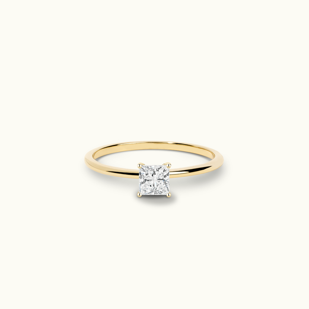 Jewellers District's Solitaire Diamond Engagement Ring with X Setting in 14k Yellow Gold, Princess