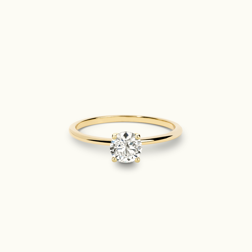 Jewellers District's Solitaire Diamond Engagement Ring with X Setting in 14k Yellow Gold, Round