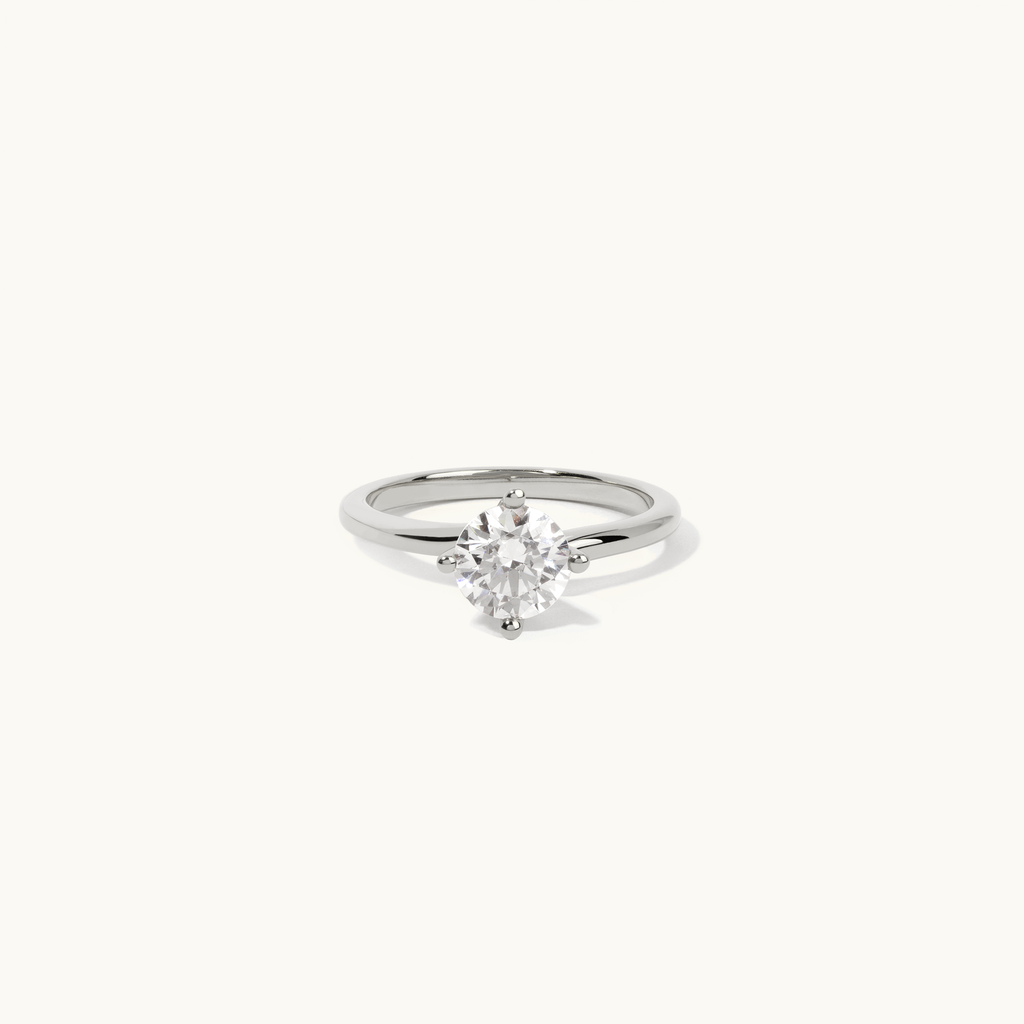 Jewellers District's Solitaire Diamond Engagement Ring with Twist Setting in 14k White Gold, Round