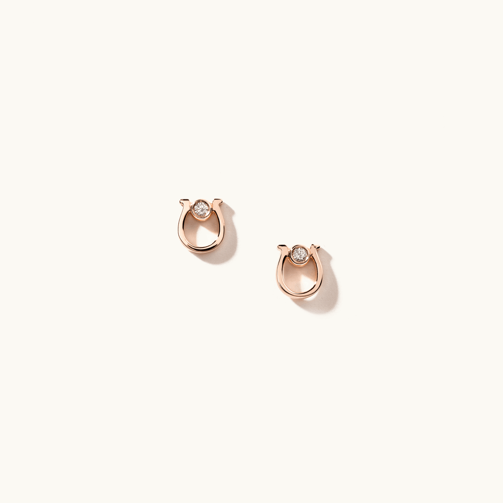 Face view of Jewellers District's Horseshoe Diamond Stud Earrings in 14k Rose Gold