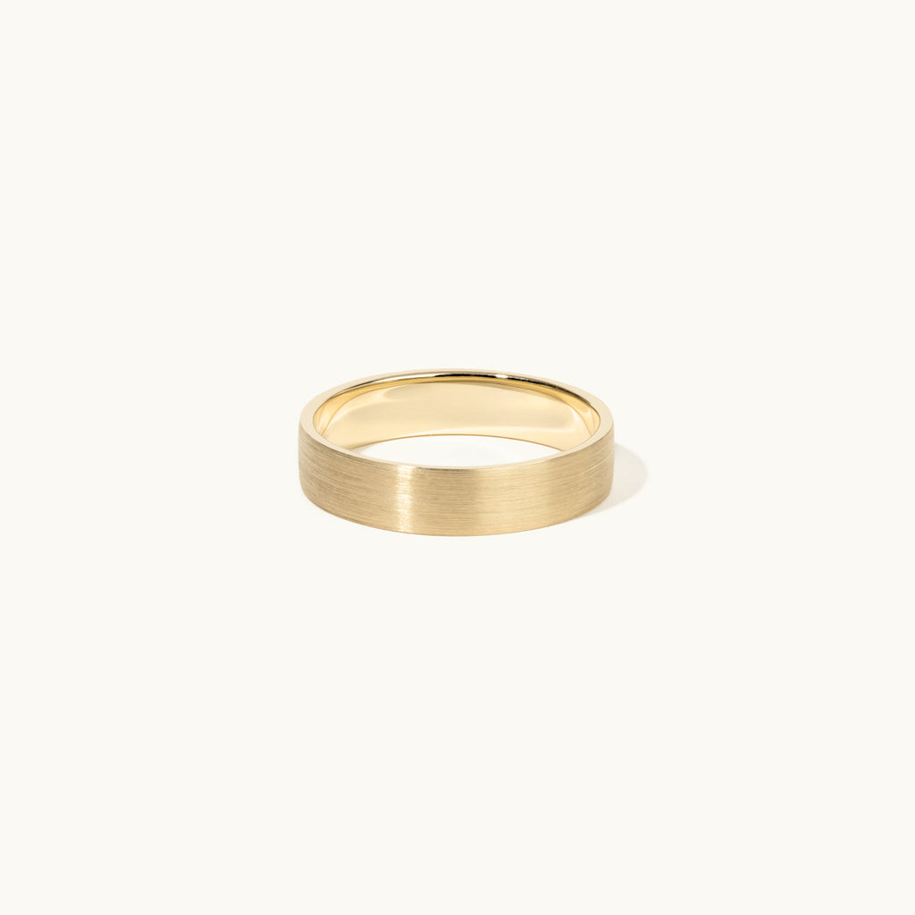 Face view of Jewellers District's Flat Brushed Wedding Ring in 14k Yellow Gold, Band: 5mm