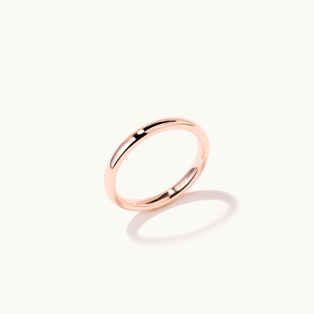 Profile view of Jewellers District's Classic Wedding Ring in 14k Rose Gold, Band: 5mm