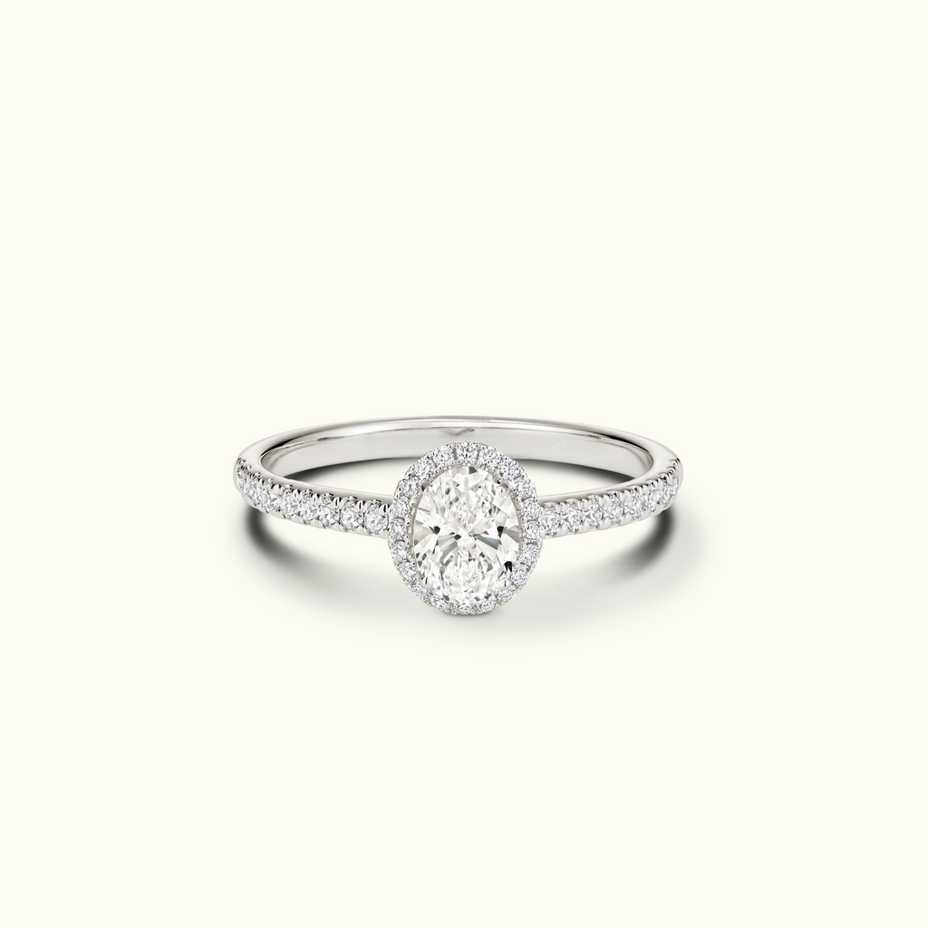 Jewellers District's Diamond Halo Engagement Ring with Diamond Bridge in 14k White Gold, Oval