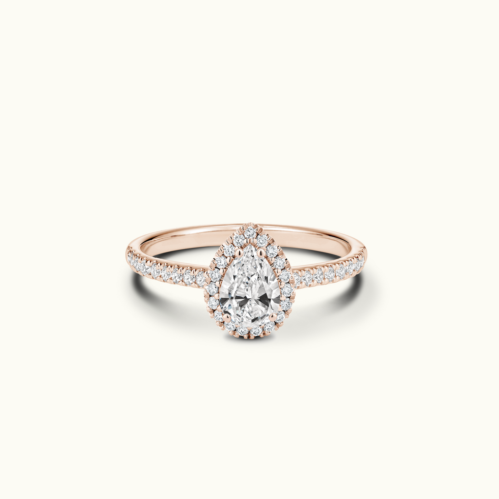 Jewellers District's Diamond Halo Engagement Ring with Diamond Bridge in 14k Rose Gold, Pear