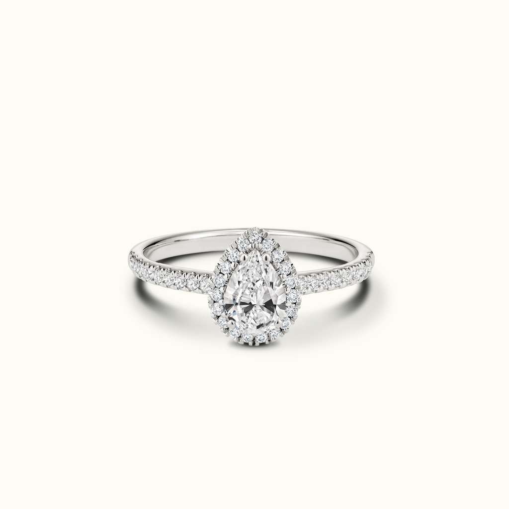 Jewellers District's Diamond Halo Engagement Ring with Diamond Bridge in 14k White Gold, Pear