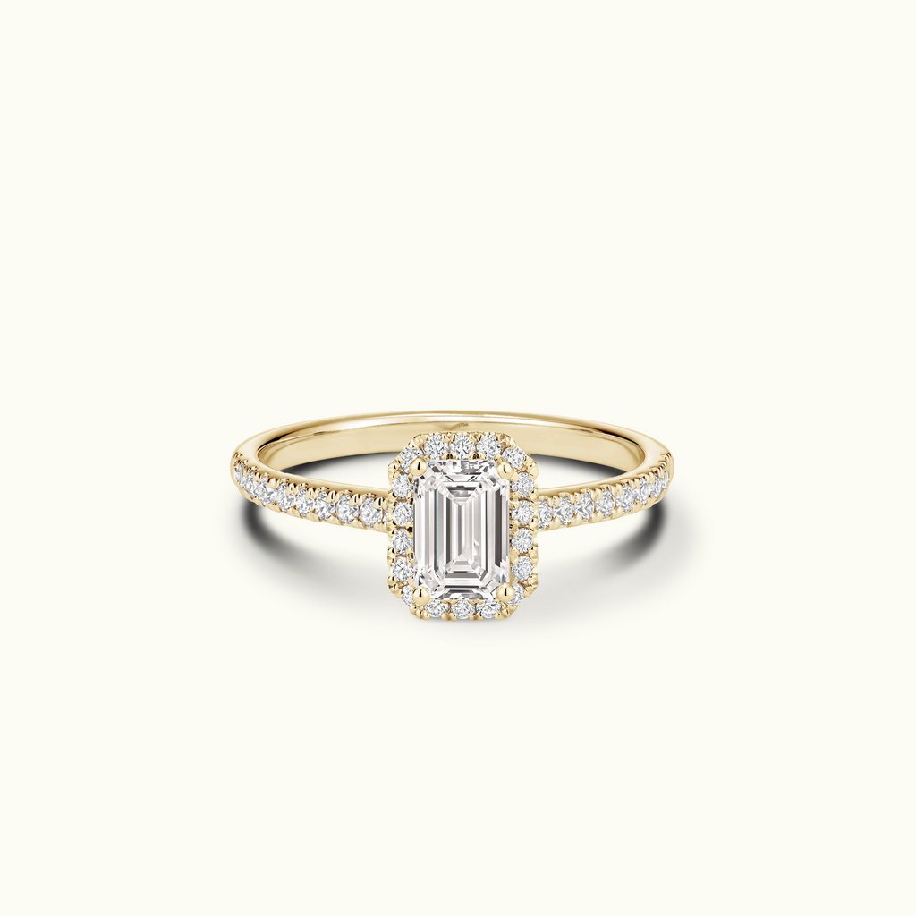 Jewellers District's Diamond Halo Engagement Ring with Diamond Bridge in 14k Yellow Gold, Emerald