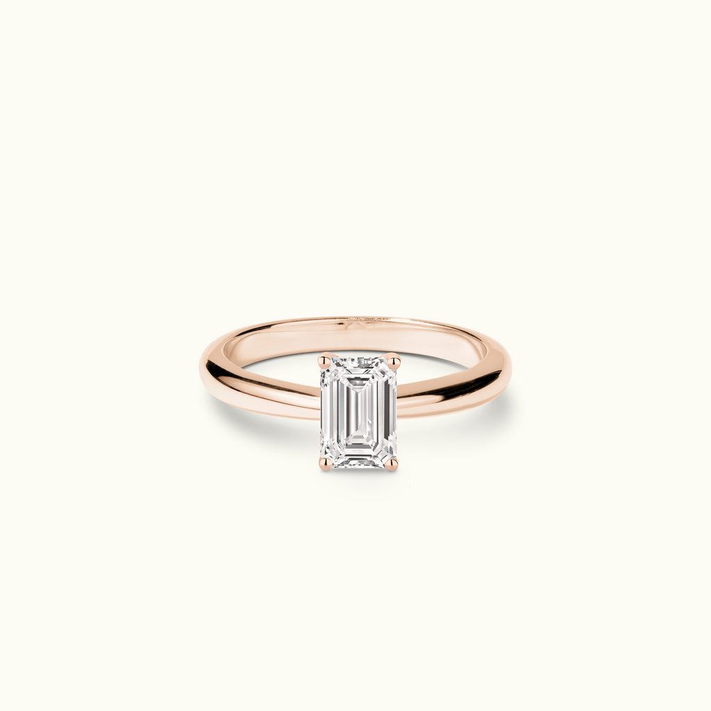 Jewellers District's Diamond Engagement Ring with Tapered Band in 14k Rose Gold, Emerald