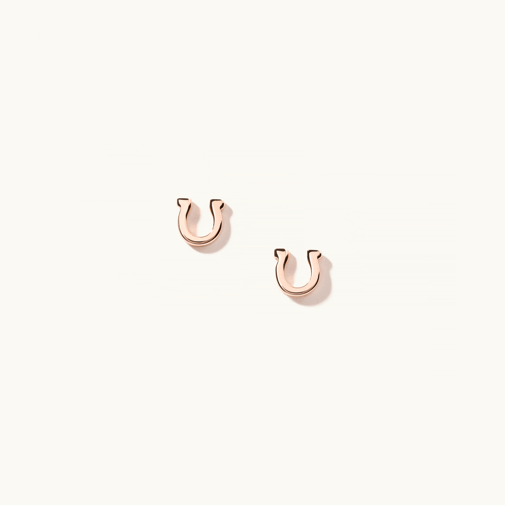 Face view of Jewellers District's Gold Horseshoe Stud Earrings in 14k Rose Gold