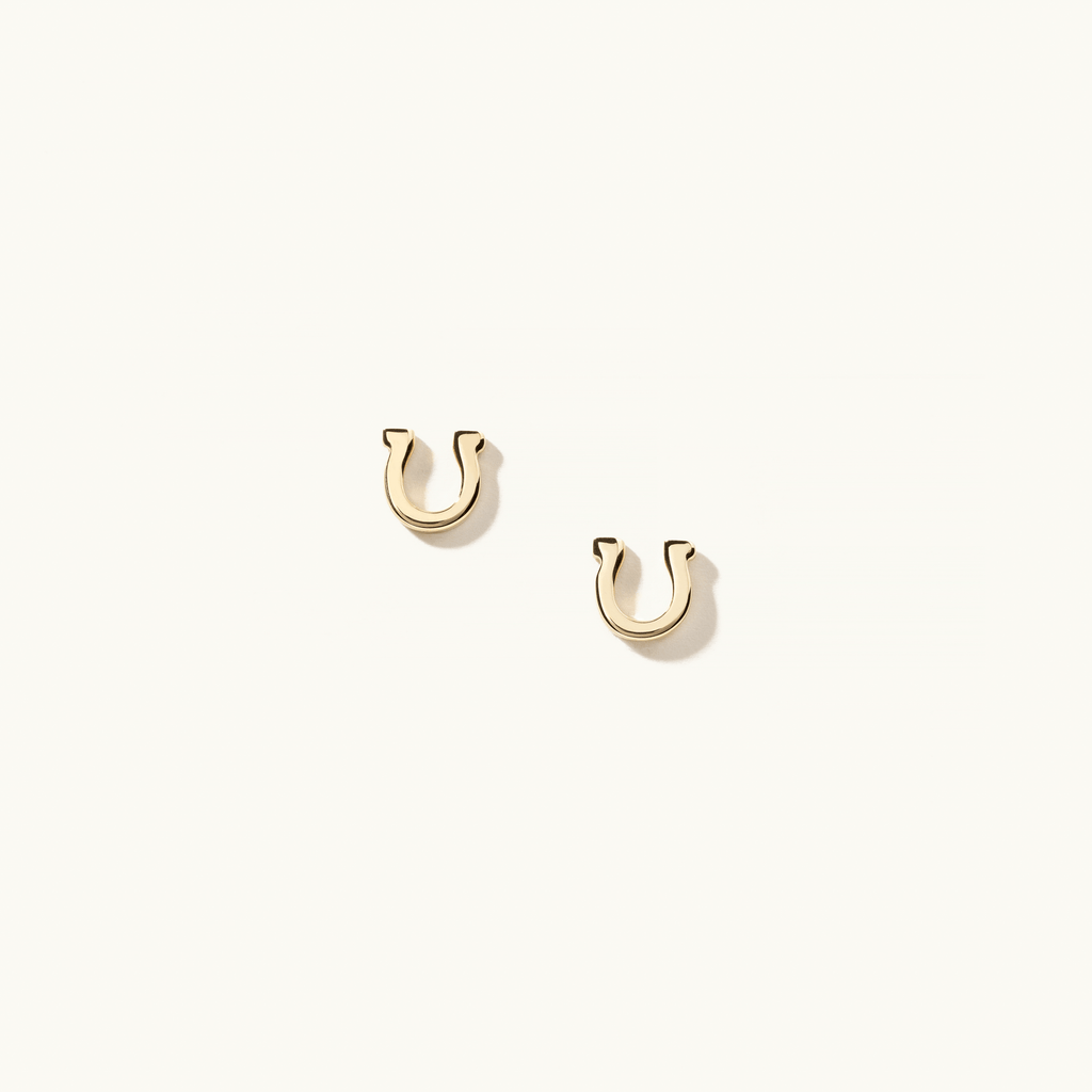 Face view of Jewellers District's Gold Horseshoe Stud Earrings in 14k Yellow Gold