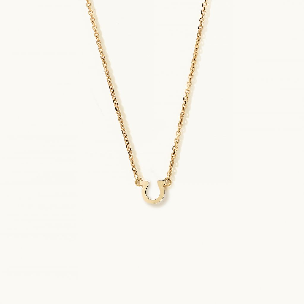 Face view of Jewellers District's Petite Gold Horseshoe Pendant Necklace in 14k Yellow Gold