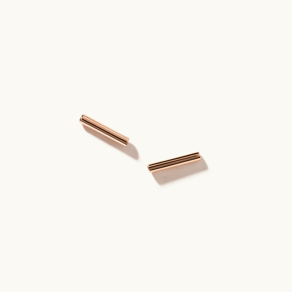 Face view of Jewellers District's Gold Bar Stud Earrings in 14k Rose Gold