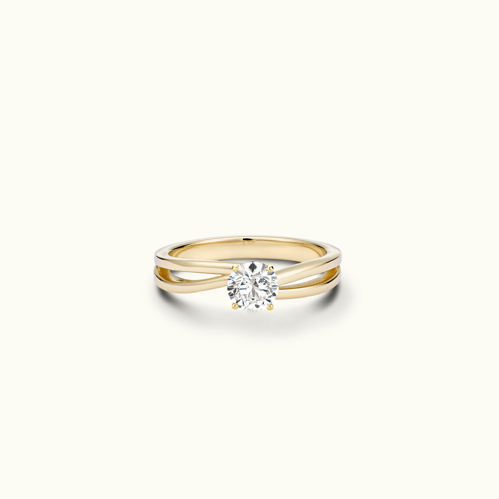 Jewellers District's Double-Shank Twist Diamond Engagement Ring in 14k Yellow Gold, Round