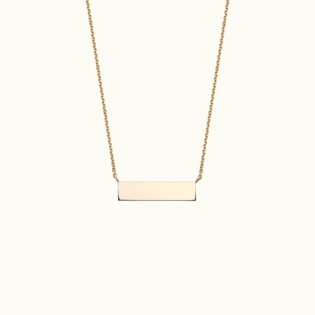 Face view of Jewellers District's Gold Bar Pendant Necklace in 14k Yellow Gold