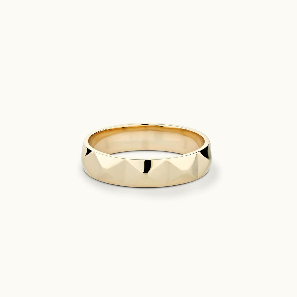 Face view of Jewellers District's Faceted Wedding Ring in 14k Yellow Gold