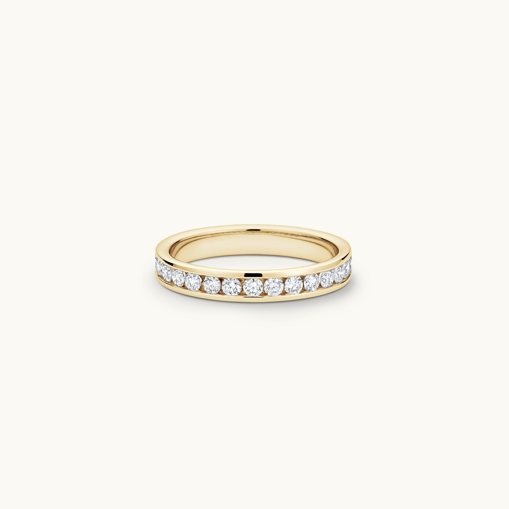 Jewellers District's Large Channel-Set Diamond Pavé Wedding Ring in 14k Yellow Gold