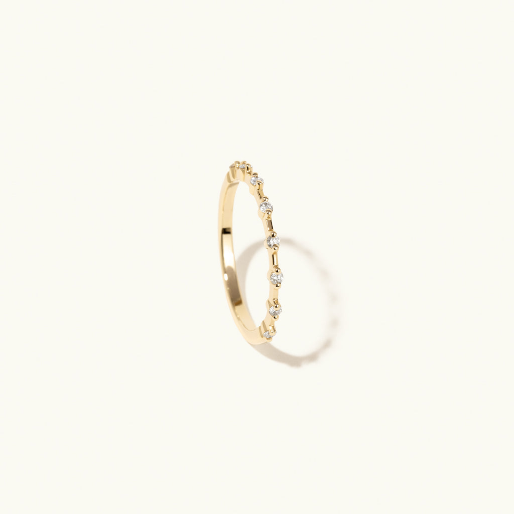 Profile view of Jewellers District's Two-Prong Diamond Wedding Ring in 14k Yellow Gold