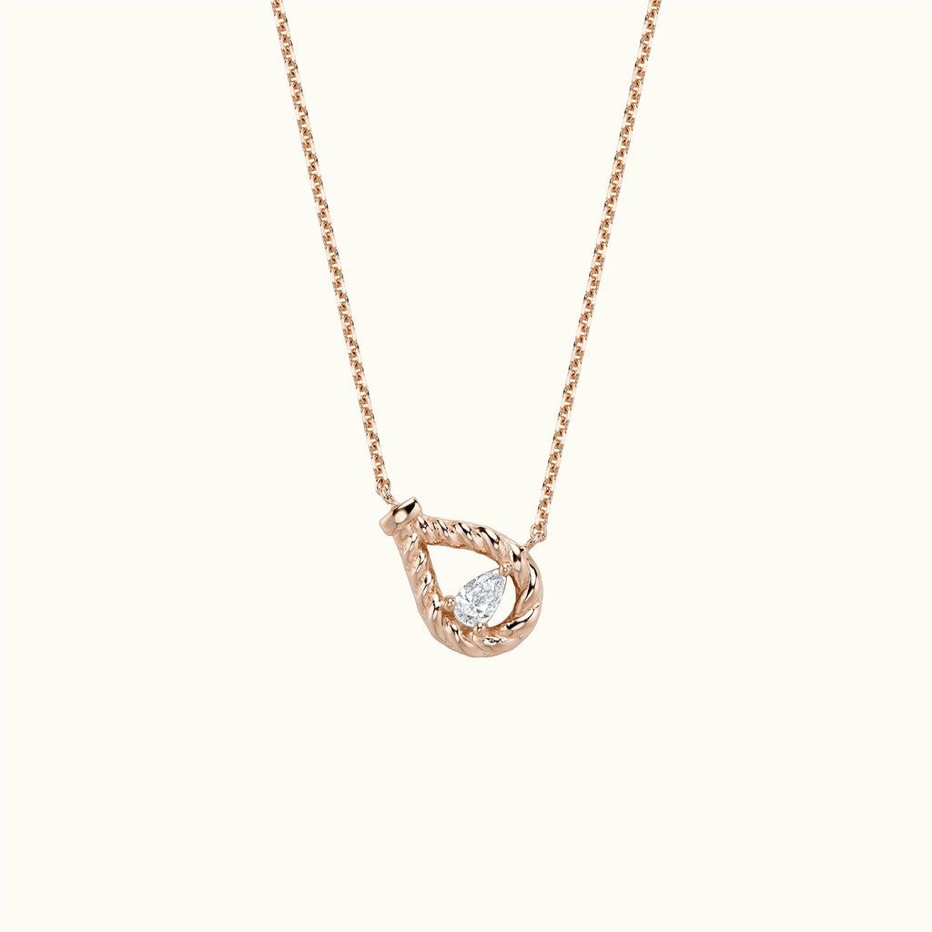 Face view of Jewellers District's Twist Pear Necklace with Accent Diamond in 14k Rose Gold