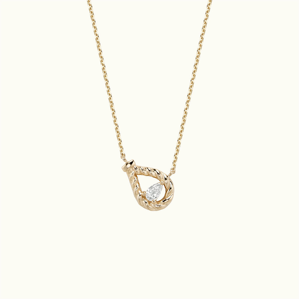 Face view of Jewellers District's Twist Pear Necklace with Accent Diamond in 14k Yellow Gold