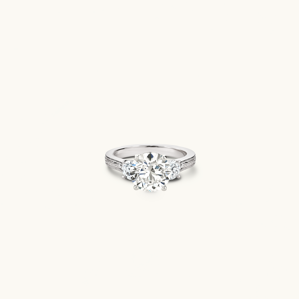 Jewellers District's Vintage Three-Stone Engagement Ring in 14k White Gold, Round