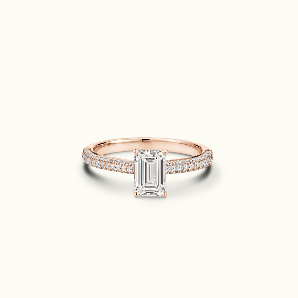 Jewellers District's Diamond Engagement Ring with Signature Knot-Basket and Micropavé Band in 14k Rose Gold, Emerald