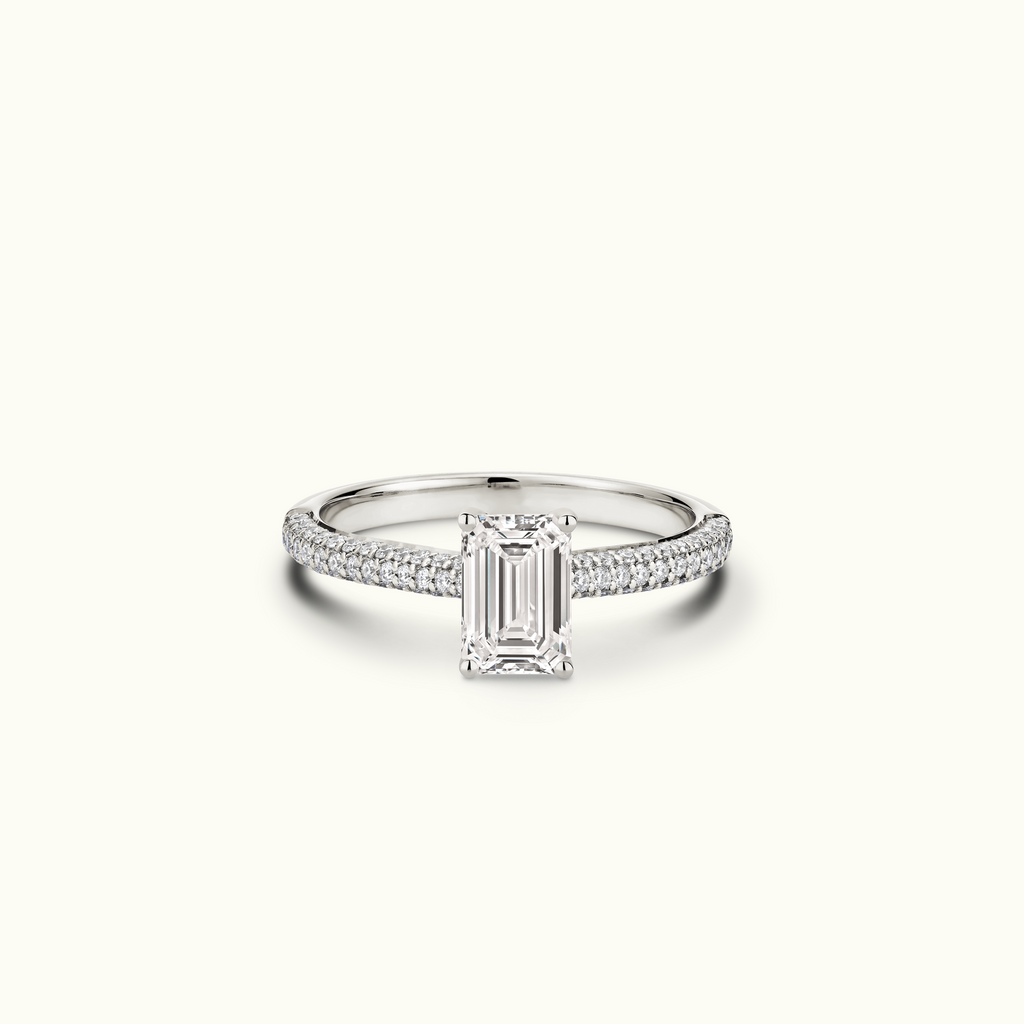 Jewellers District's Diamond Engagement Ring with Signature Knot-Basket and Micropavé Band in 14k White Gold, Emerald