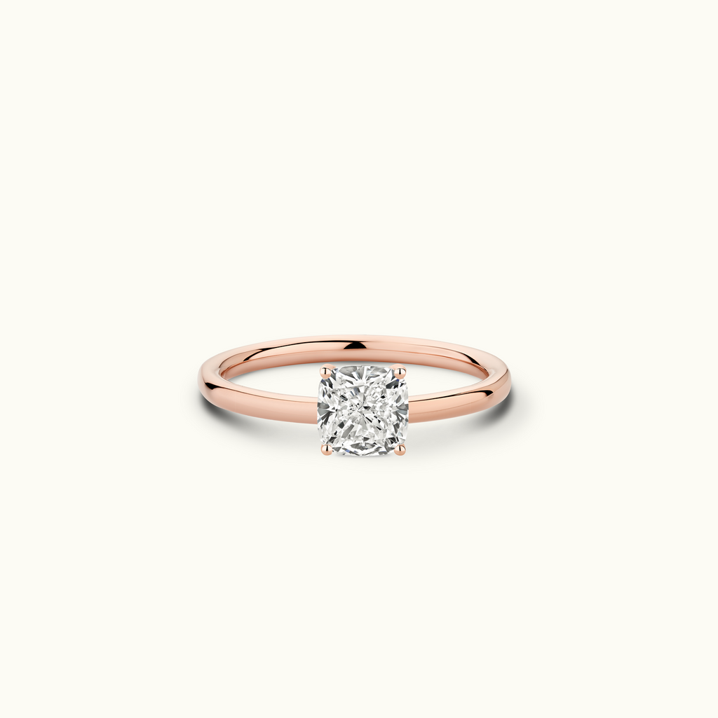 Jewellers District's Solitaire Diamond Engagement Ring with Signature Knot-Basket in 14k Rose Gold, Cushion