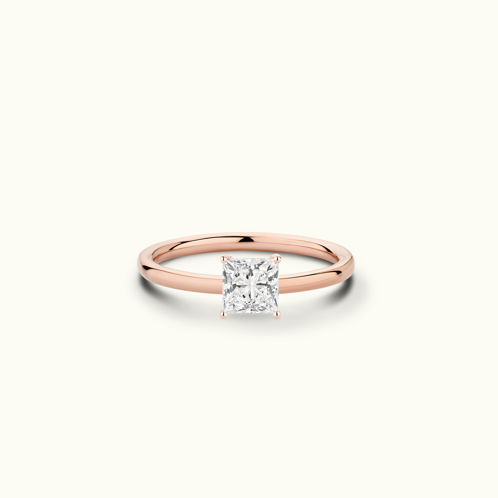 Jewellers District's Solitaire Diamond Engagement Ring with Signature Knot-Basket in 14k Rose Gold, Princess