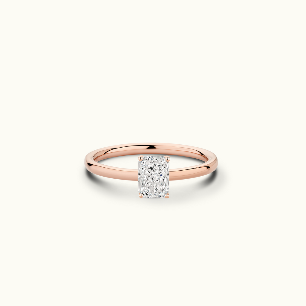 Jewellers District's Solitaire Diamond Engagement Ring with Signature Knot-Basket in 14k Rose Gold, Radiant