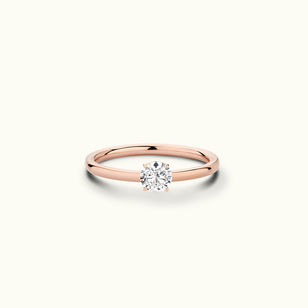 Jewellers District's Solitaire Diamond Engagement Ring with Signature Knot-Basket in 14k Rose Gold, Round