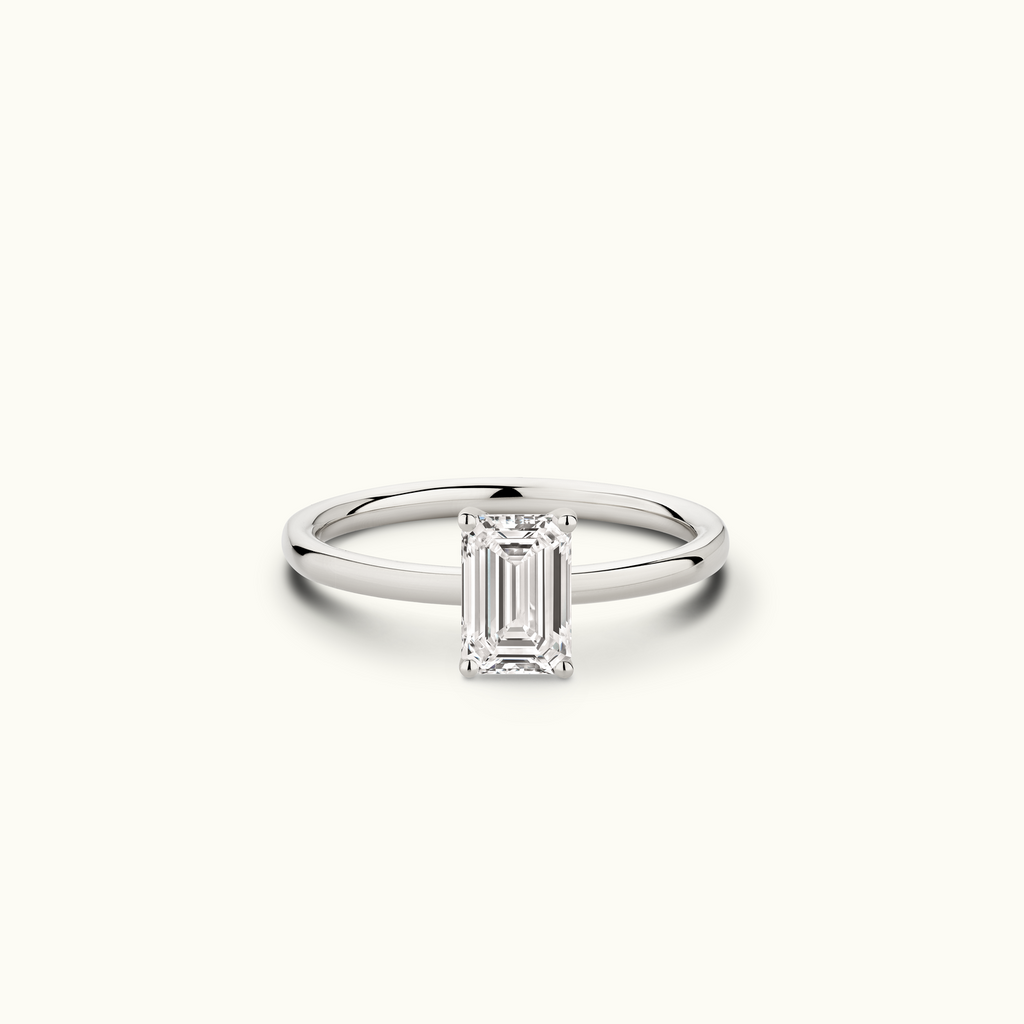 Jewellers District's Solitaire Diamond Engagement Ring with Signature Knot-Basket in 14k White Gold, Emerald