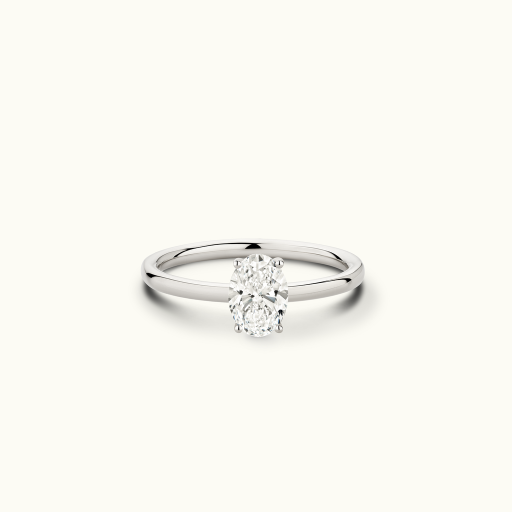 Jewellers District's Solitaire Diamond Engagement Ring with Signature Knot-Basket in 14k White Gold, Oval