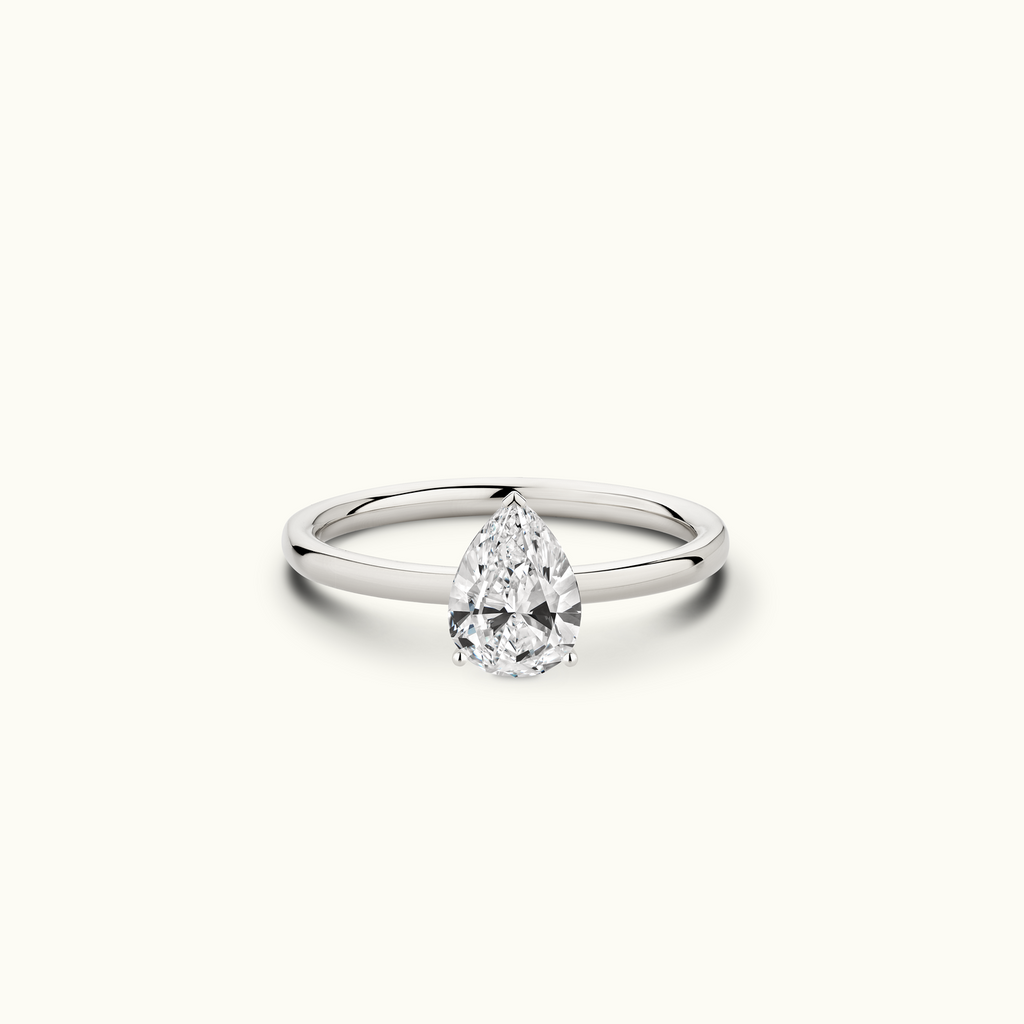 Jewellers District's Solitaire Diamond Engagement Ring with Signature Knot-Basket in 14k White Gold, Pear