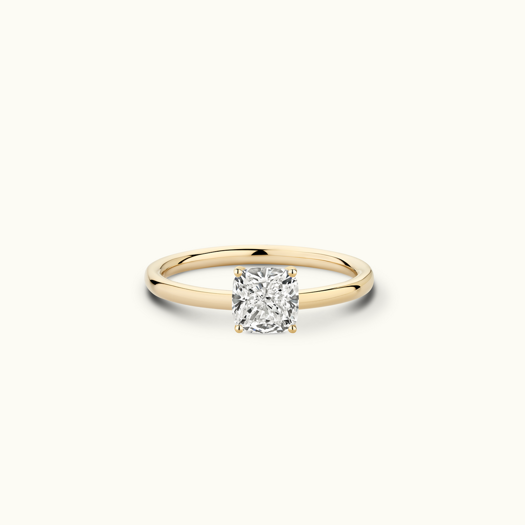 Jewellers District's Solitaire Diamond Engagement Ring with Signature Knot-Basket in 14k Yellow Gold, Cushion