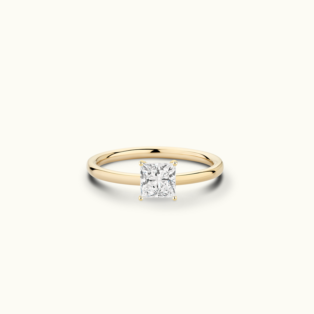 Jewellers District's Solitaire Diamond Engagement Ring with Signature Knot-Basket in 14k Yellow Gold, Princess