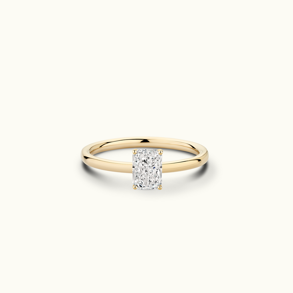 Jewellers District's Solitaire Diamond Engagement Ring with Signature Knot-Basket in 14k Yellow Gold, Radiant