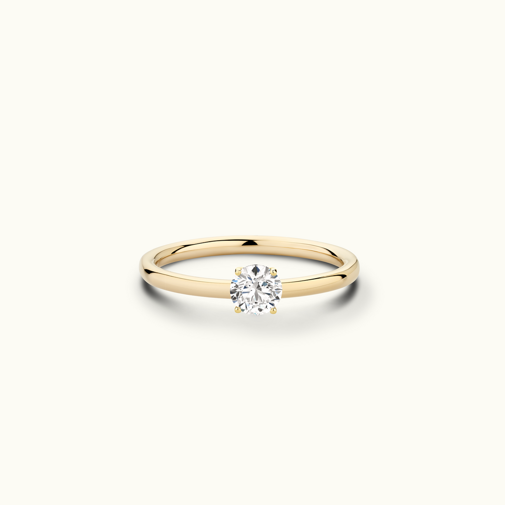 Jewellers District's Solitaire Diamond Engagement Ring with Signature Knot-Basket in 14k Yellow Gold, Round