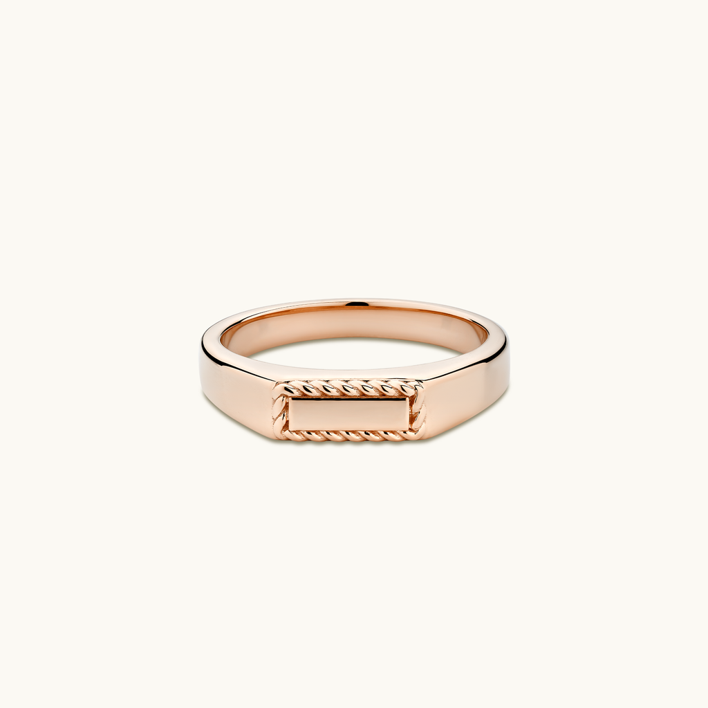 Face view of Jewellers District's Signet Wedding Ring with Twist Accents in 14k Rose Gold