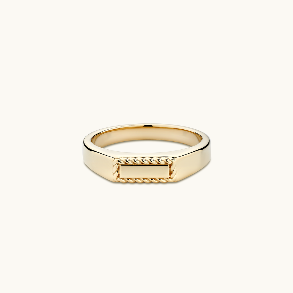 Face view of Jewellers District's Signet Wedding Ring with Twist Accents in 14k Yellow Gold