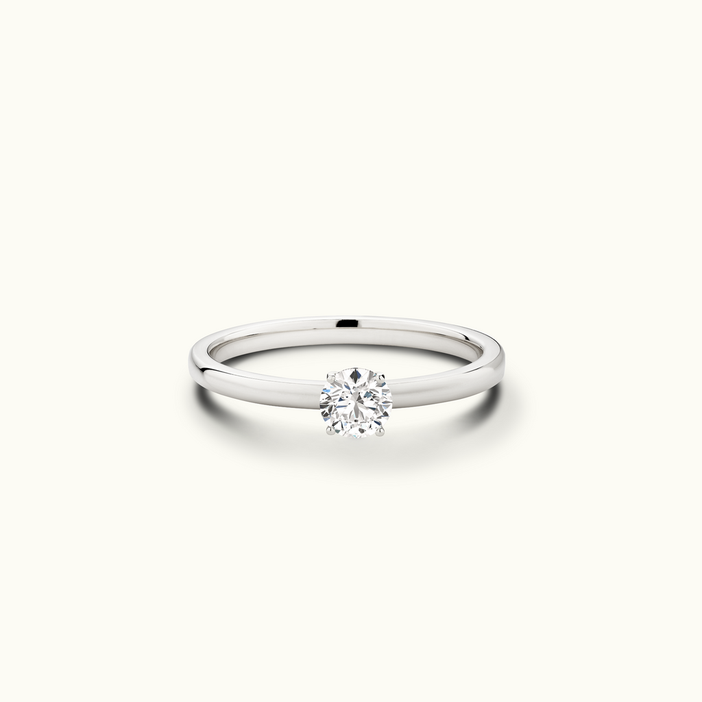 Jewellers District's Diamond Engagement Ring with Signature Knot-Basket and Accent Diamonds in 14k White Gold, Round