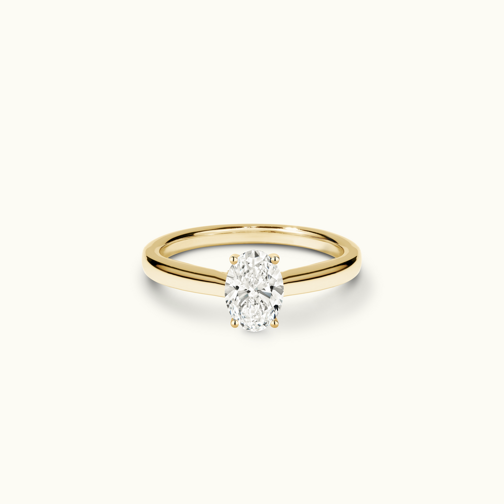 Jewellers District's Diamond Engagement Ring with Diamond Bridge and Cathedral-Setting in 14k Yellow Gold, Oval