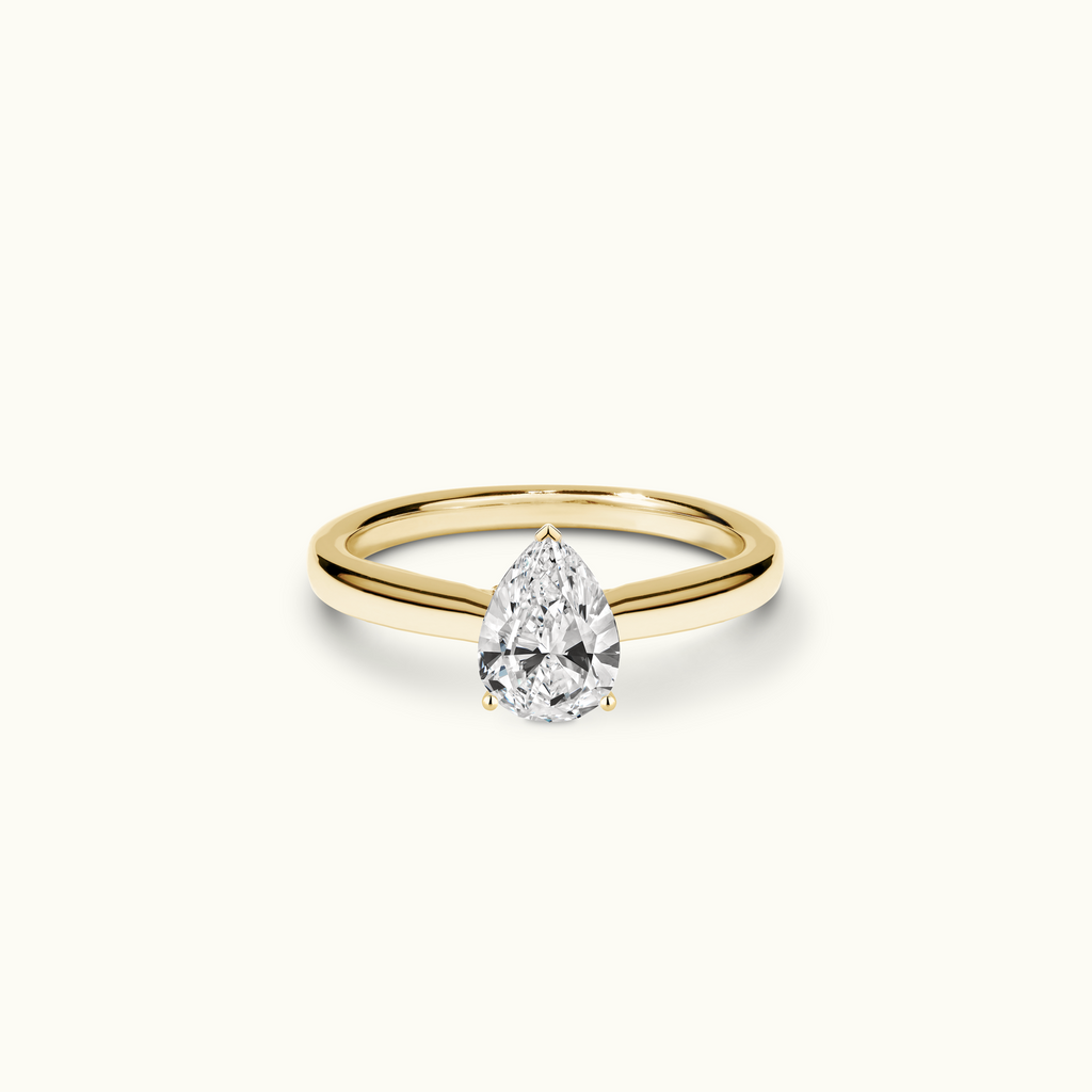 Jewellers District's Diamond Engagement Ring with Diamond Bridge and Cathedral-Setting in 14k Yellow Gold, Pear