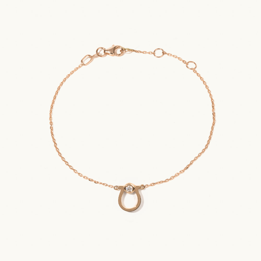 Face view of Jewellers District's Gold Horseshoe Chain Bracelet with Diamond in 14k Rose Gold