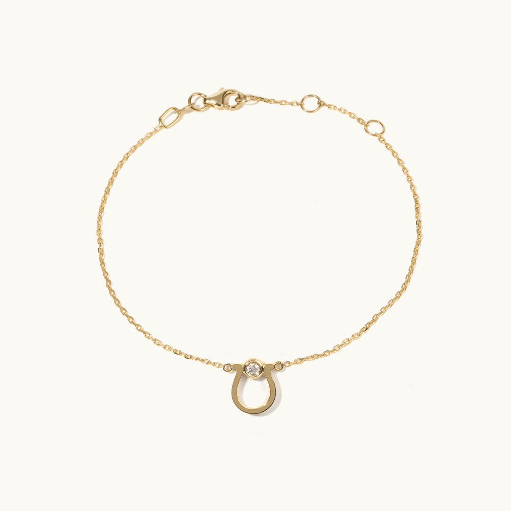 Face view of Jewellers District's Gold Horseshoe Chain Bracelet with Diamond in 14k Yellow Gold