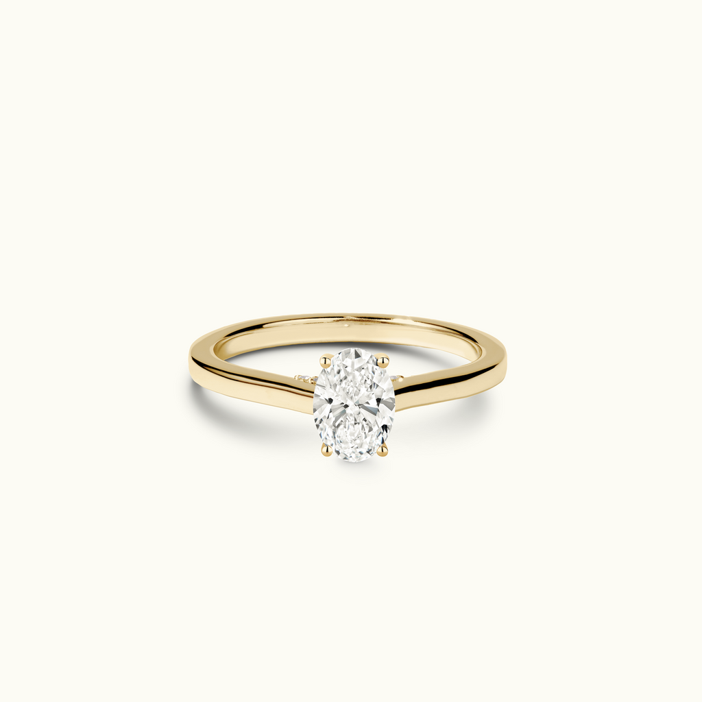 Jewellers District's Six-Prong Diamond Engagement Ring with Diamond Bridge in 14k Yellow Gold, Oval