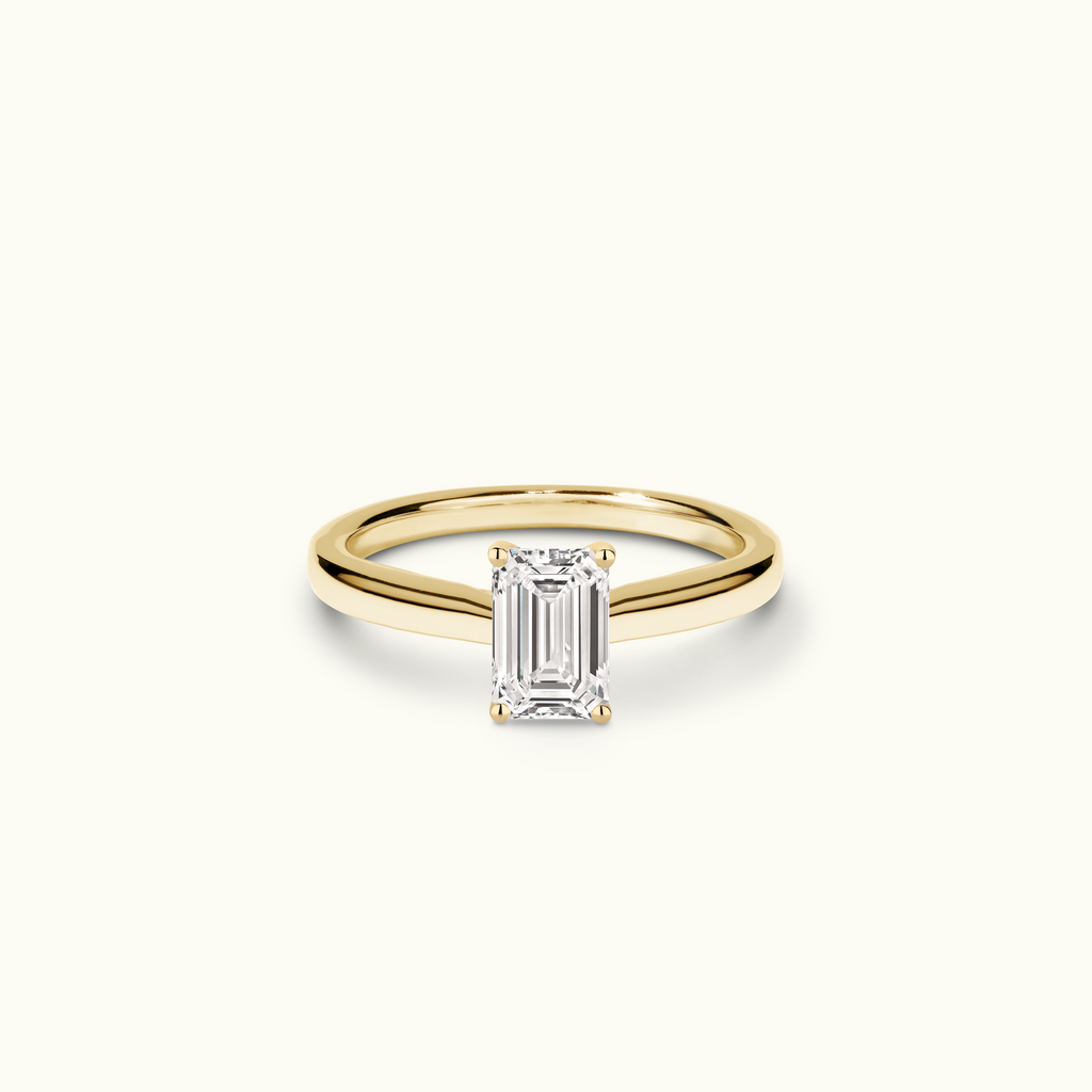 Jewellers District's Diamond Engagement Ring with Diamond Bridge and Cathedral-Setting in 14k Yellow Gold, Emerald